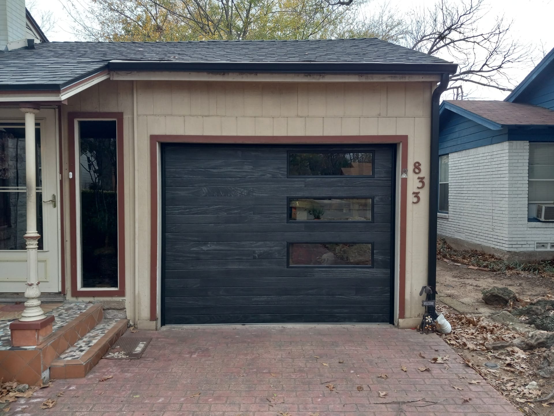 Faux Wood Modern Garage Door with Vertical Wide Windows
